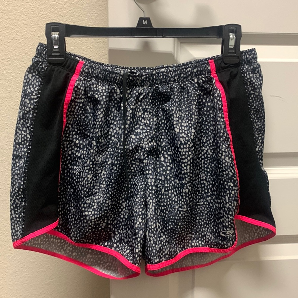 Women’s Champion Running Shorts, Size Medium. Black with hot pink accents.